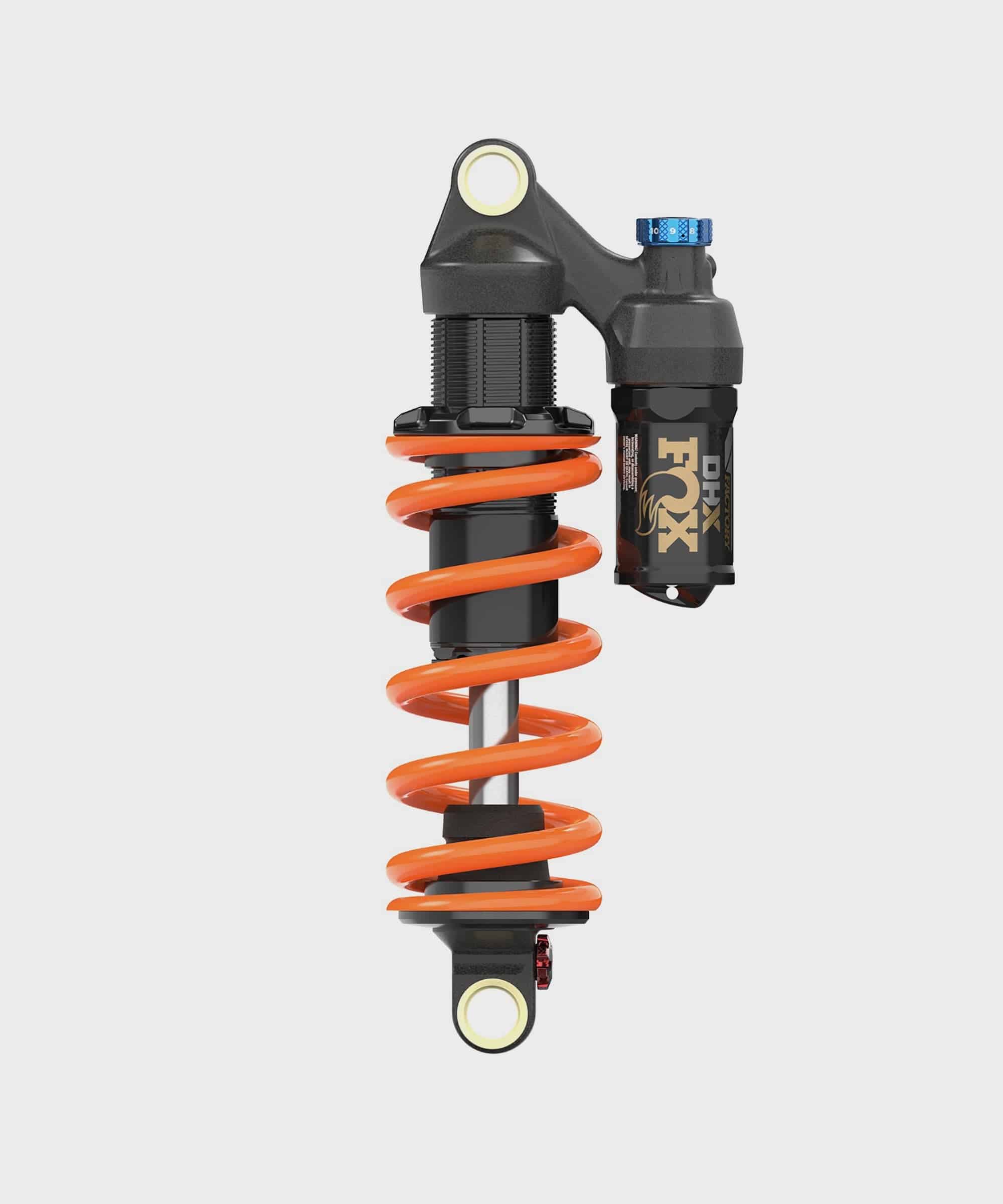 Fox DHX Factory 2-Position Adjustable Rear Shock Damper for coil suspension, showing the high-performance component with adjustment knobs.