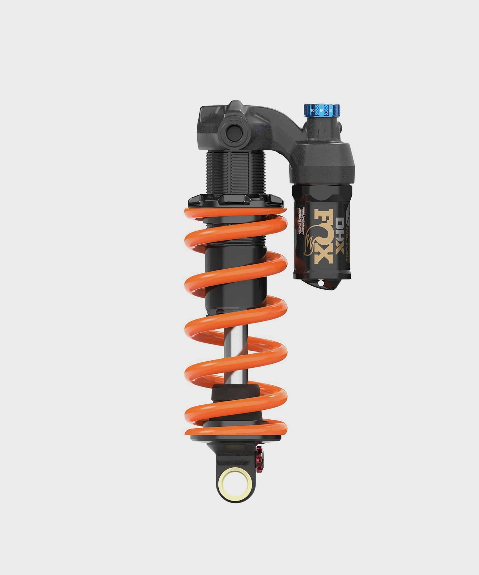 Fox DHX Factory 2-Position Adjustable Rear Shock Damper for coil suspension, featuring a black metal body and adjustment knobs.