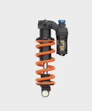 Fox DHX Factory 2-Position Adjustable Rear Shock Damper for coil suspension, featuring a black metal body and adjustment knobs.