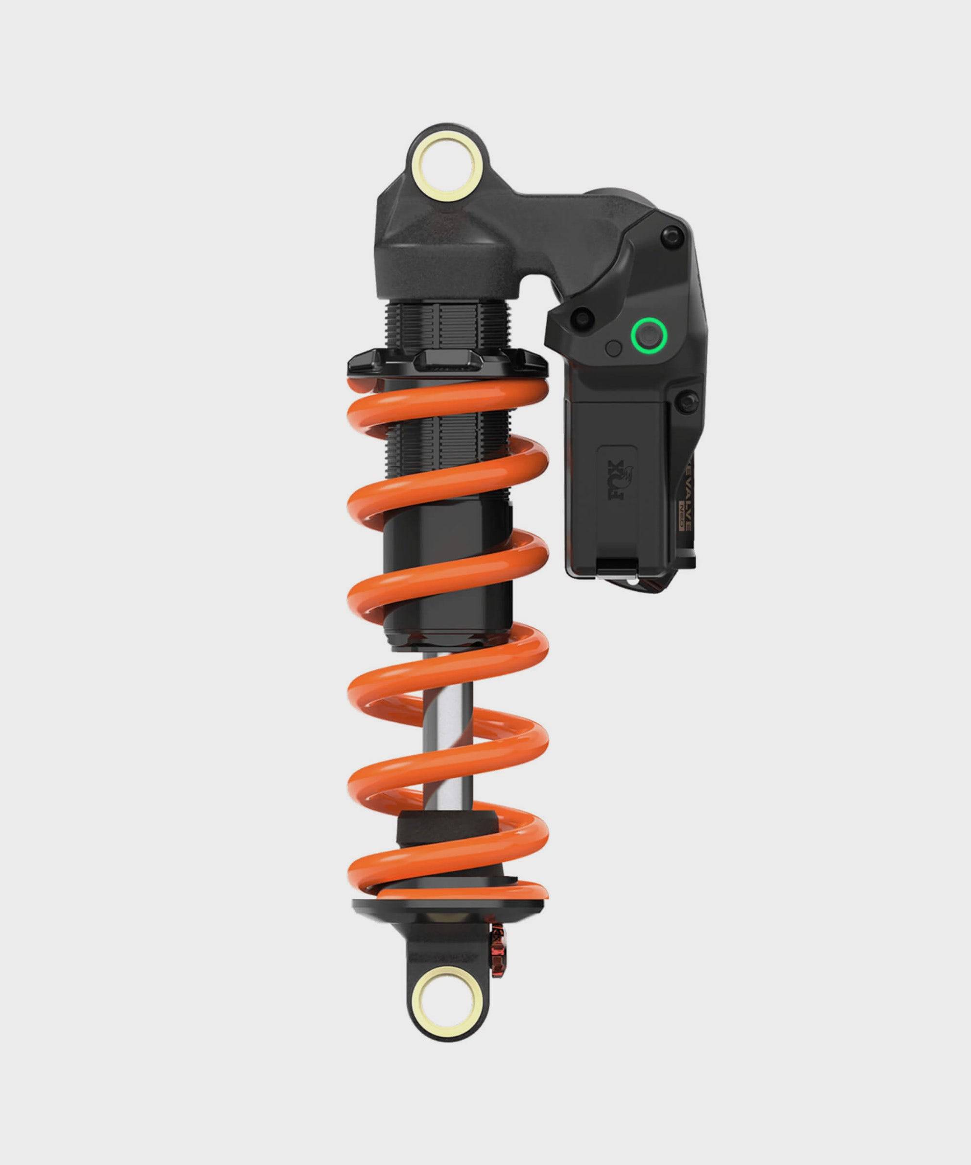 Fox DHX Live Valve Neo rear shock with sensor, electronic suspension component for mountain bikes, showcasing the shock's design and linkage.