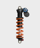 Fox DHX2 Factory mountain bike rear shock with 2-position adjustable damping, black component with branding visible.