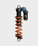 Fox DHX2 Factory coil rear shock for mountain biking with four-way adjustability, designed for MTB trail riding components.