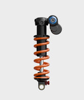 Fox DHX2 Factory Coil rear shock for mountain biking, showing four-way adjustability and high-performance MTB trail components