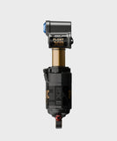 Fox Float X2 Factory mountain bike rear shock with 2-position adjustable settings, showing its sleek black and silver design.