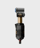Fox Float X2 Factory rear shock with 4-way adjustability and pressure balancing, showing the high-performance suspension component.
