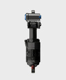 Fox Float X2 Performance Elite rear shock for downhill bikes, showing adjustable suspension components in a close-up image.