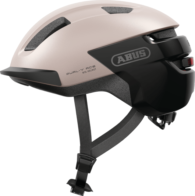 ABUS PURL-Y ACE urban e-bike helmet in champagne gold with integrated rechargeable LED light, NTA certified for safety and style.