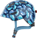 ABUS Smiley 3.0 LED kids cycling helmet in blue with adjustable fit, integrated LED light, and deep protective design.