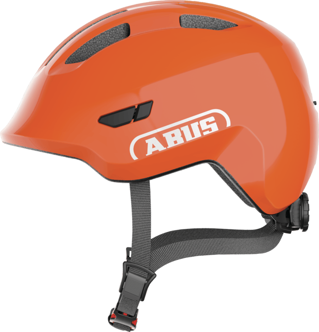Shiny orange ABUS Smiley 3.0 kids cycling helmet with adjustable fit and deep protection, shown from the front.