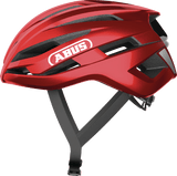 ABUS StormChaser ACE red cycling helmet with ventilation for road racing and cyclocross, featuring aerodynamic design and adjustable straps.