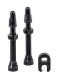 Pair of Hutchinson black tubeless valves for bicycle tires, providing reliable airtight seals and durable performance.