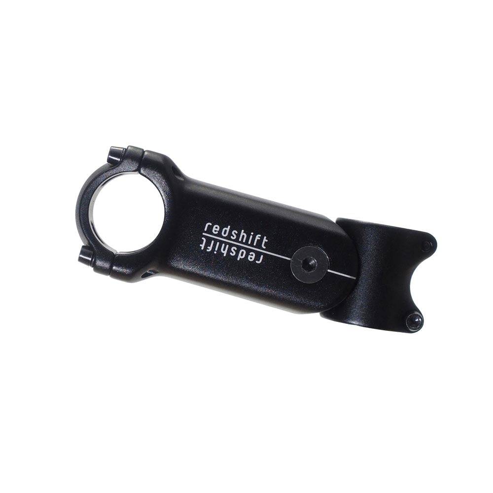 Redshift Sports ShockStop suspension stem for road bikes with adjustable elastomers, showing the red and black component with mounting hardware.