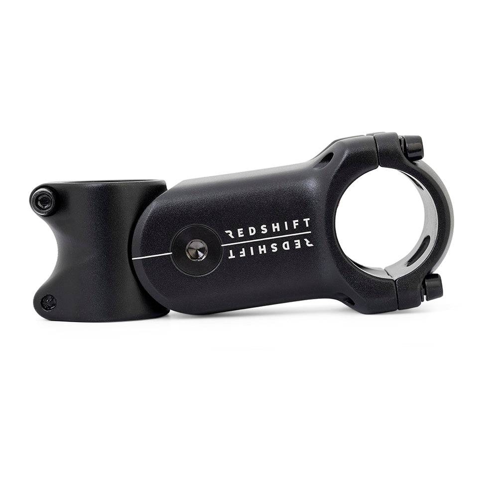 Redshift Sports ShockStop suspension stem for road bikes with adjustable elastomers, showing the bike component in close-up.