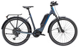 Trek Allant+ 6 Lowstep 2025 electric hybrid bike for urban commuting and leisure rides, shown in a city setting.
