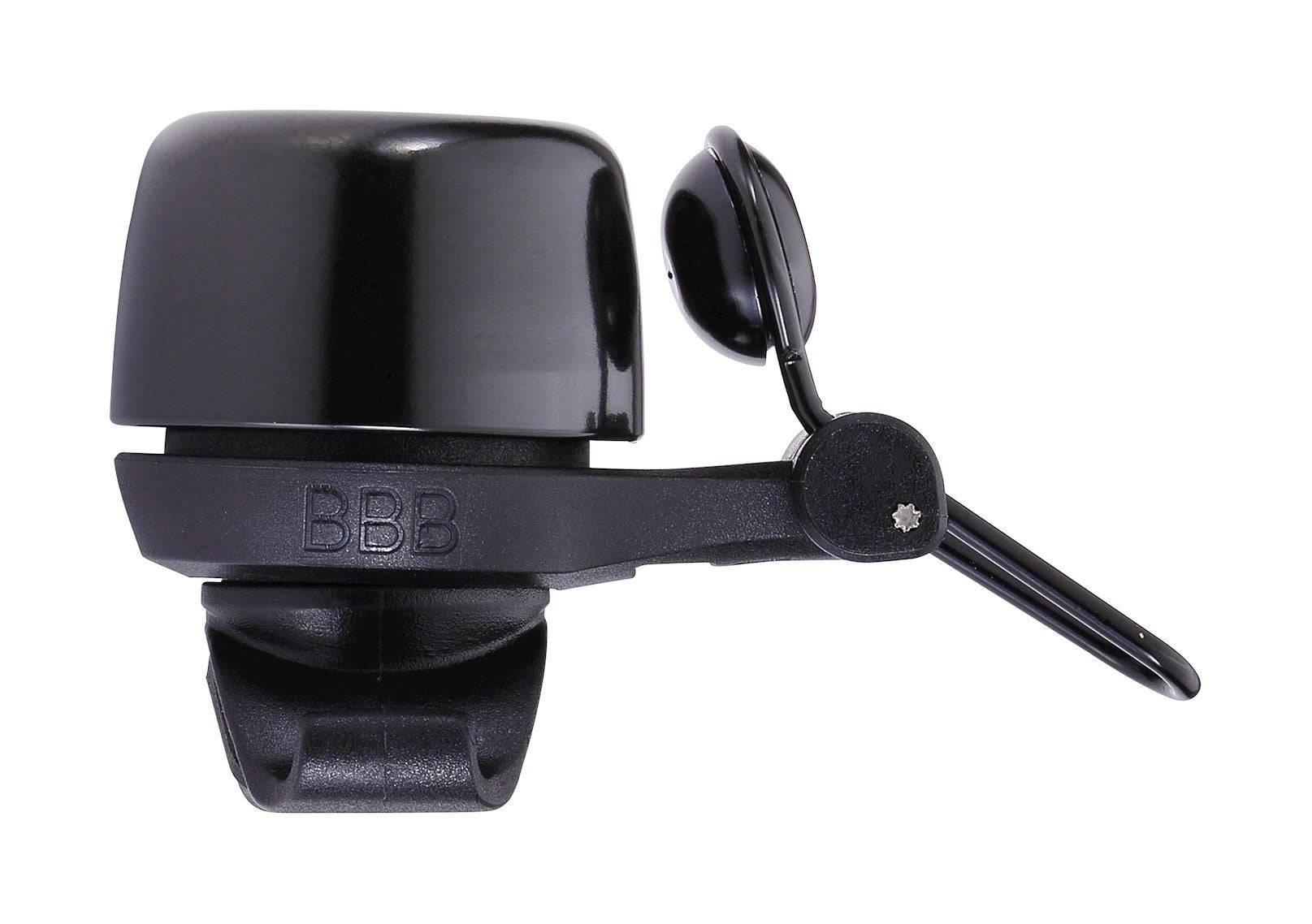 BBB-17 noisy brass bike bell with quick-release straps mounted on a bicycle handlebar, designed for all bike handlebars.