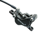 Hayes Dominion T4 disc brake caliper for bike disc brake system, showcasing a black component with mounting brackets and hydraulic fittings.