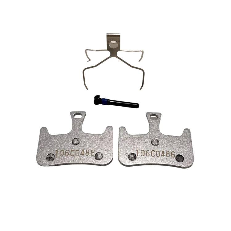 Hayes Dominion T2 semi-metallic brake pads compatible with Dominion A2 bike components, shown in a close-up view.