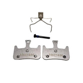 Hayes Dominion T2 semi-metallic brake pads compatible with Dominion A2 bike components, shown in a close-up view.