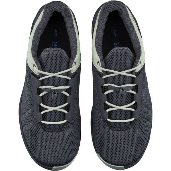 Shimano EX3W women's MTB cycling shoes in black, featuring comfortable design and sustainable materials, shown from side view.