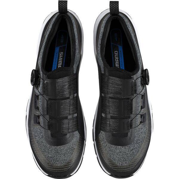Shimano EX7 black MTB shoes with BOA L6 dial and ULTREAD EX outsole, designed for mountain biking durability and grip.