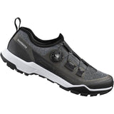 Shimano EX7 black mountain biking shoes with BOA L6 dial and ULTREAD EX outsole, designed for MTB riding.