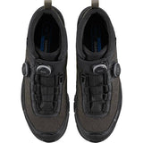 Shimano EX9 MTB shoes with BOA Fit System and waterproof Gore-Tex, featuring durable black design and rugged mountain biking sole.