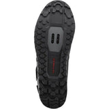 Shimano GE5 gravel shoes with SPD cleat compatibility and Enduro rubber sole, shown from side angle with black design.