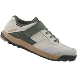 Shimano GE7 gravel shoes featuring ULTREAD GE rubber and TORBAL 2.0 midsole, designed for off-road cycling comfort and durability.