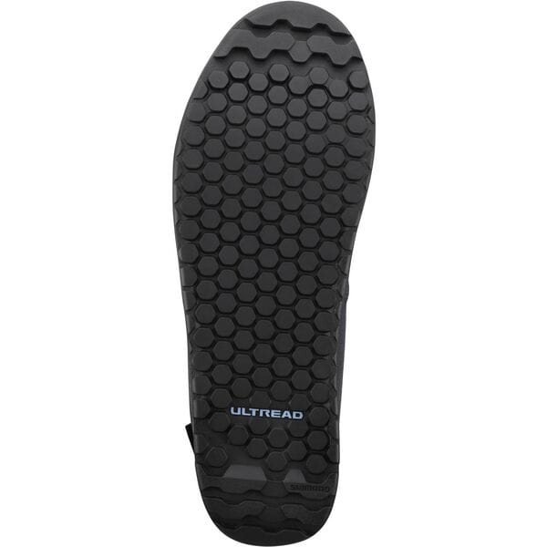 Shimano GF4 gravel shoes with ULTREAD grip for flat pedals, featuring durable design and comfortable fit for gravel riding.