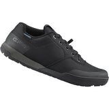 Shimano GF4 gravel shoes with ULTREAD® grip for flat pedals, lightweight cycling footwear designed for gravel riding.