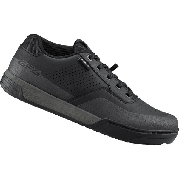 Shimano GF6 gravel shoes with ULTREAD grip and TORBAL 2.0 control, shown in black with lace closure and rugged sole.