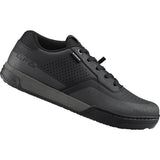 Shimano GF6 gravel shoes with ULTREAD grip and TORBAL 2.0 control, shown in black with lace closure and rugged sole.