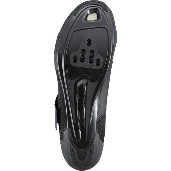 Shimano IC100 indoor cycling road shoes with breathable mesh and SPD compatibility, shown in black with secure straps.