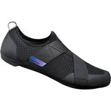 Shimano IC100 indoor cycling road shoes with breathable mesh and SPD compatibility, shown in black with sleek design.