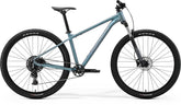 Merida Big Nine 80 mountain bike with blue frame, aluminum hardtail design, modern geometry, suitable for trail riding and off-road cycling.