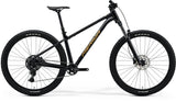 Merida Big Trail 300 29-inch hardtail mountain bike with Shimano CUES U4000 components and black-bronze frame.