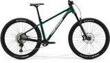 Merida Big Trail 600 mountain bike with 29-inch wheels, 140mm air fork, Shimano Deore M6100 gears, green and white color.
