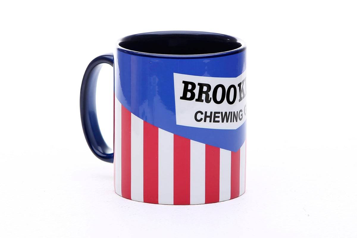 Global Cycling Club Brooklyn cycling jersey-inspired mug with Brooklyn skyline design, side view, collectible cycling accessories.