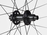 Bontrager Kovee Elite 30 TLR Boost 29-inch mountain bike wheel, carbon tubeless-ready MTB component, close-up view