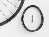 Bontrager Line Elite 30 TLR Boost 27.5 MTB front wheel in black, showcasing tubeless-ready rim and boost hub design.
