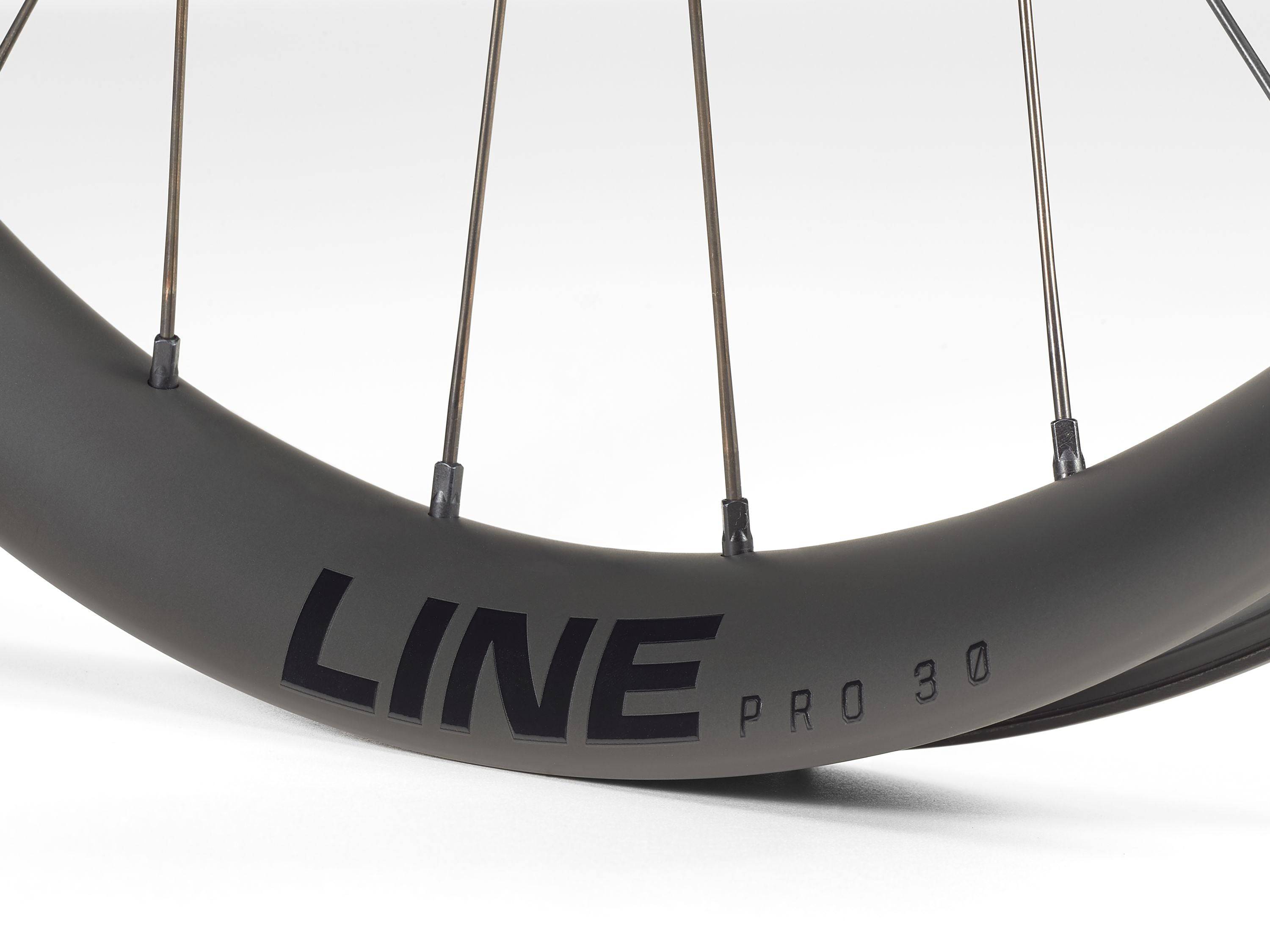 Bontrager Line Pro 30 TLR Boost 27.5-inch MTB front wheel in black with tubeless ready rim and no cassette.