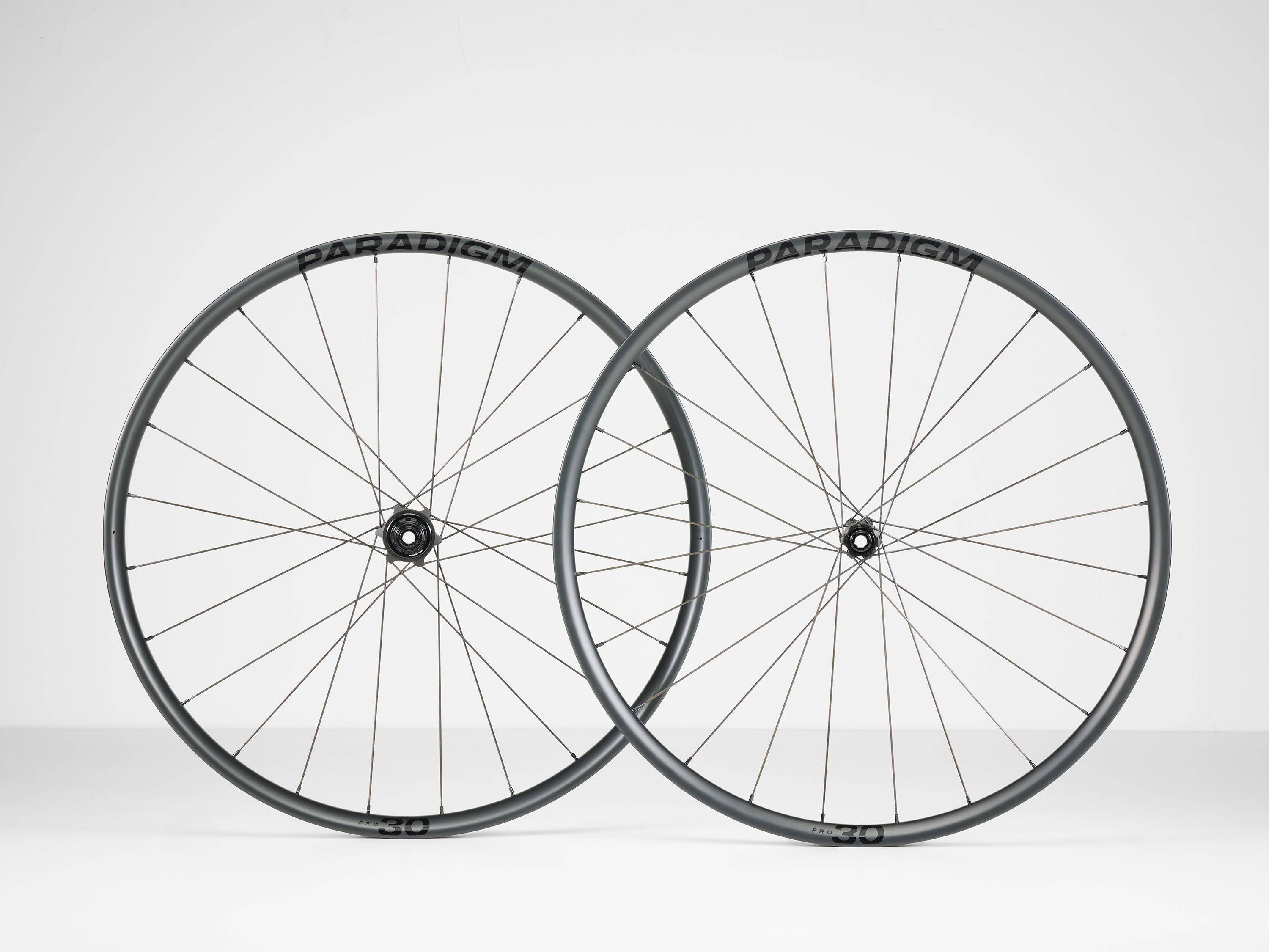 Bontrager Paradigm Pro 30 TLR disc road wheel with aerodynamic design and tubeless-ready road bike component.