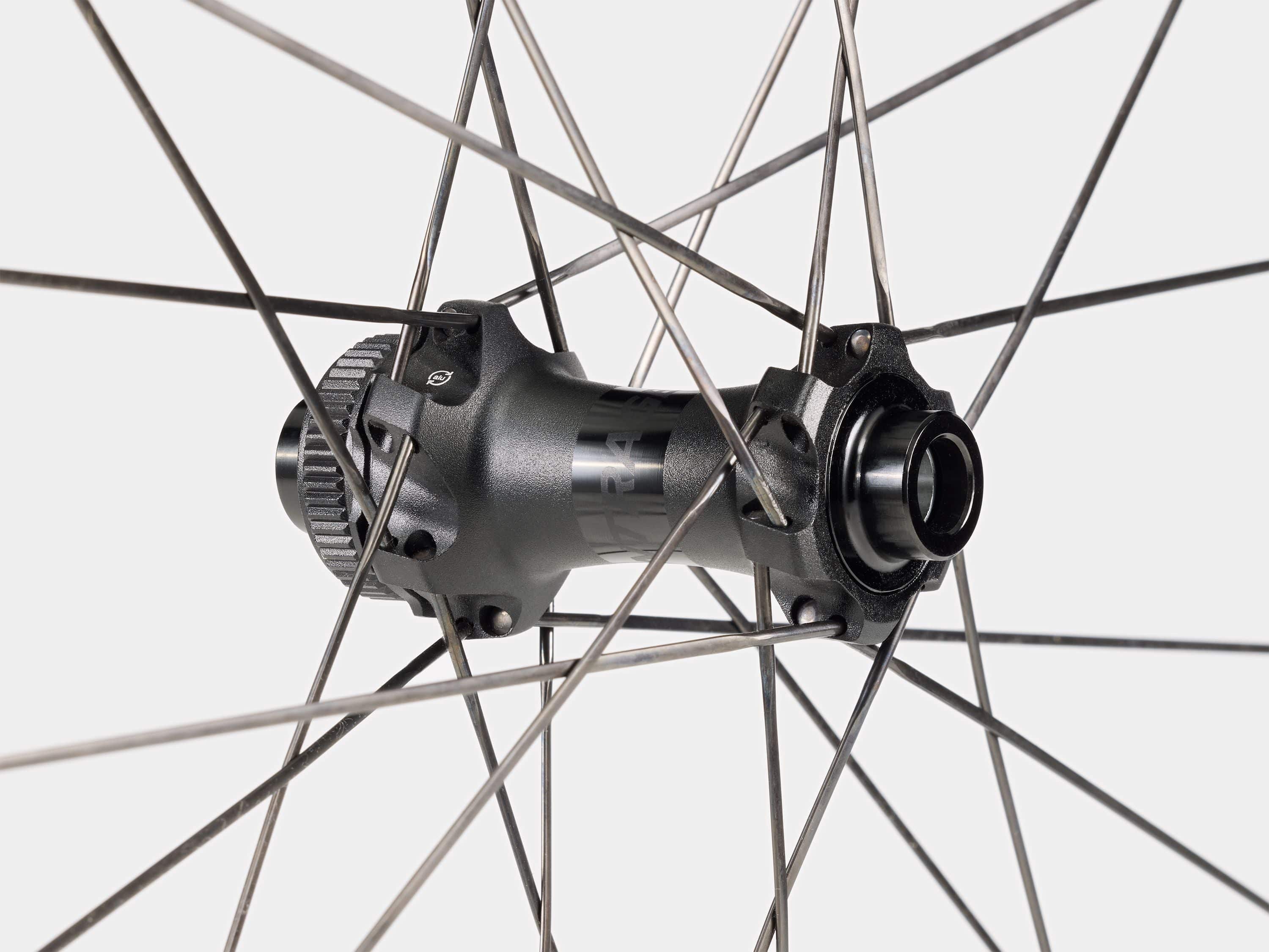 Bontrager Paradigm Pro 30 TLR disc road wheel showing aerodynamic rim and tubeless-ready design for high-performance cycling.