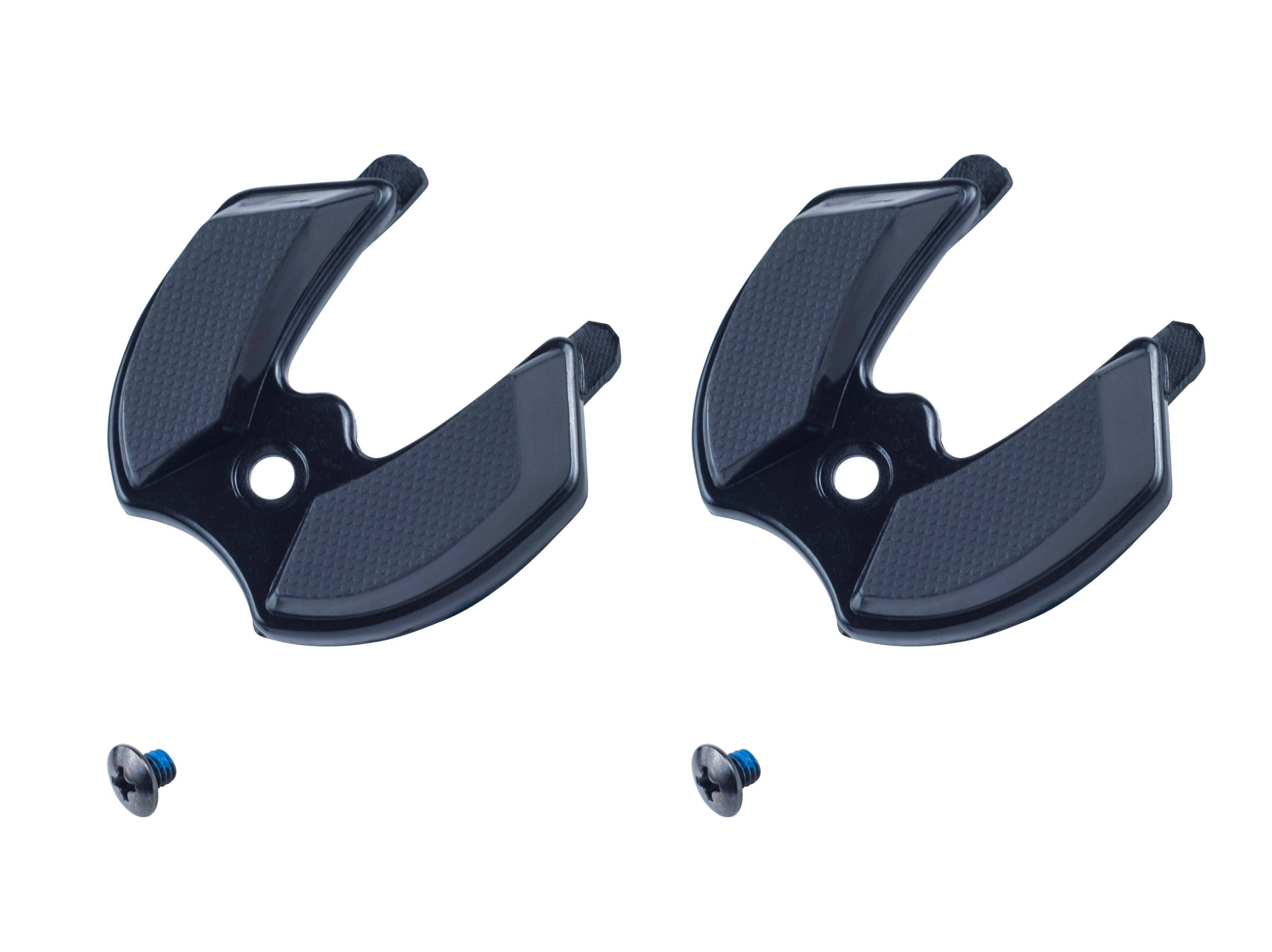 Bontrager universal replacement heel studs with mounting screws for road bike shoes, shown on a pair of cycling shoes.