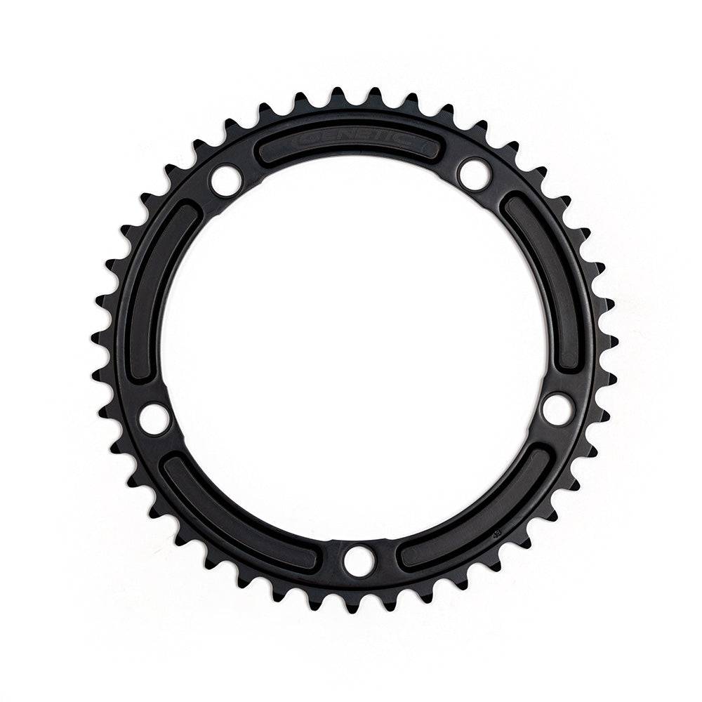 Genetic CNC machined tibia track chainring, 1/2 x 1/8 inch, for road bike components, with detailed metal finish and teeth design.