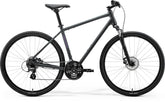 Gray Merida Crossway 10 hybrid bike with Shimano 7-speed gears and disc brakes, featuring a lightweight frame and ergonomic design.
