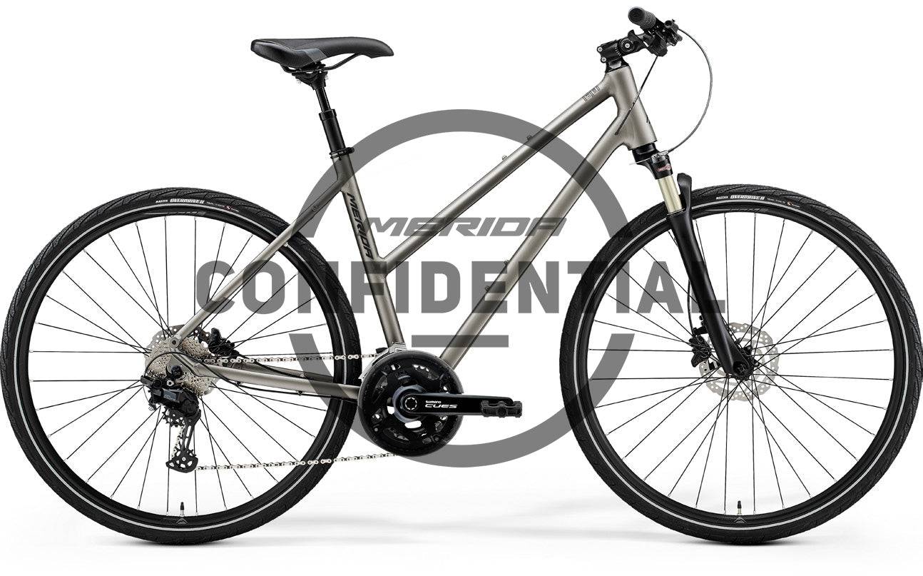 Grey Merida Crossway 10-V Women's MY26 hybrid bike with Shimano RD-M310 gears and V-brakes, shown from side view.