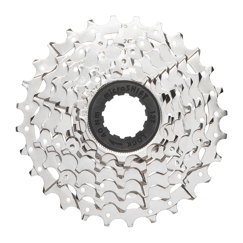 MicroSHIFT H072 7-speed 12-28T cassette for HG hub, cycling components, with metal sprockets on a bike wheel.