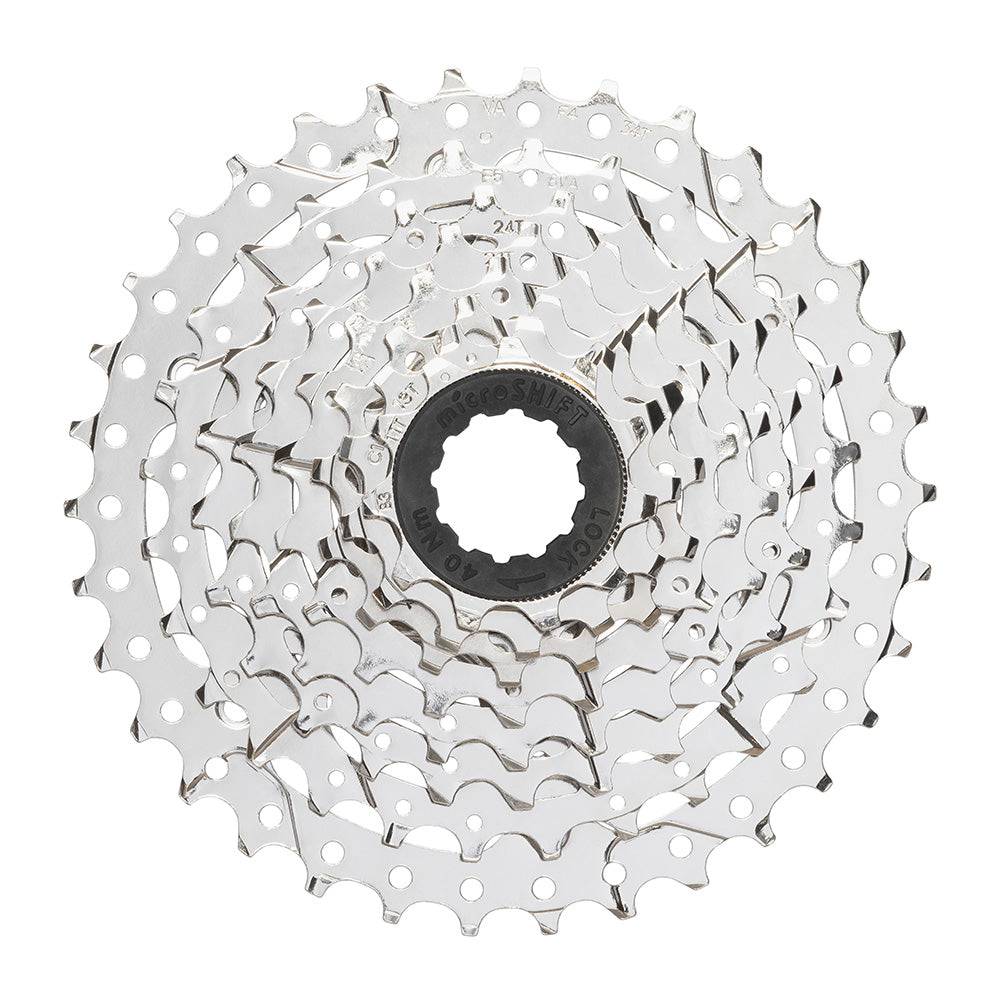 MicroSHIFT H082 8-speed cassette for e-bikes and high torque riding, showing metal sprockets and gear teeth in close-up.