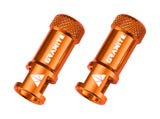 Orange Granite Juicy Nipple valve cap with removal tool and optional valve stem set for vehicle tire maintenance.
